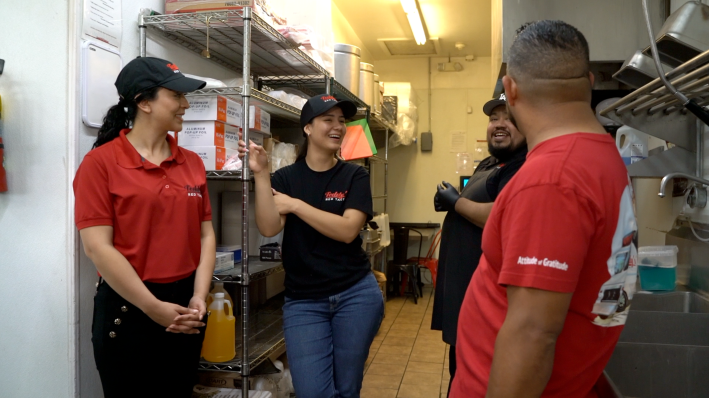 Teddy Vasquez talking to his staff at  his East L.A. location.